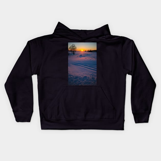 Sunset winter landscape with snow-covered road in violet and pink colors Kids Hoodie by Olga Berlet
